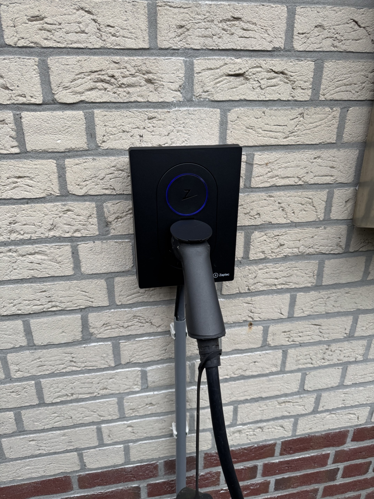 Zaptec Go on the wall of our home